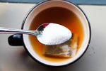 Can I add sugar to green tea?